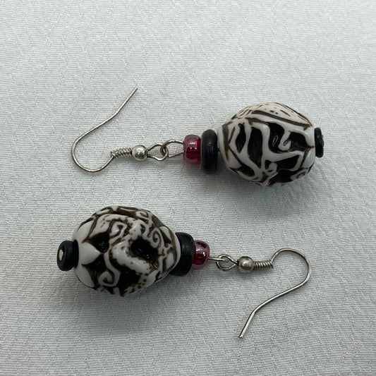 Sølv øreringe med arabesk perle