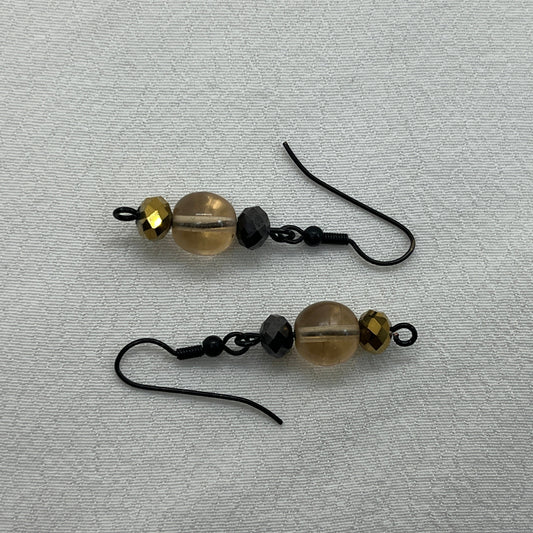 Sorte øreringe med champagne