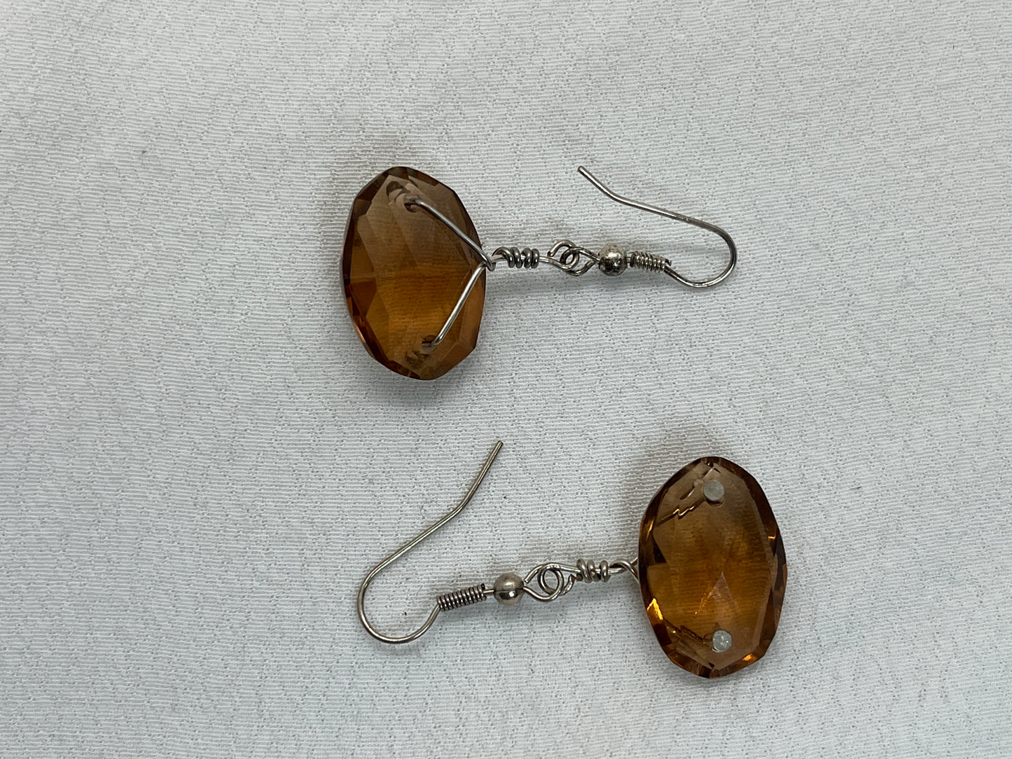 Ørering i sølv med en kvart lysekrone