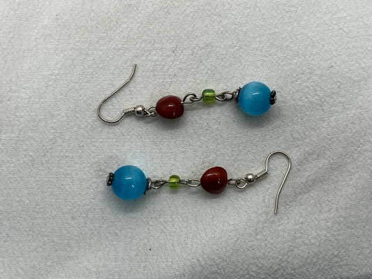 Sølv øreringe med blå Cateye perle