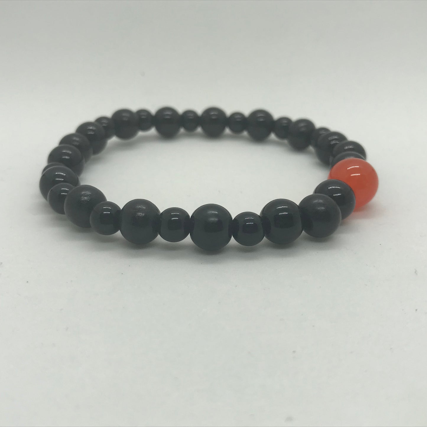 Armbånd sort med orange Jade