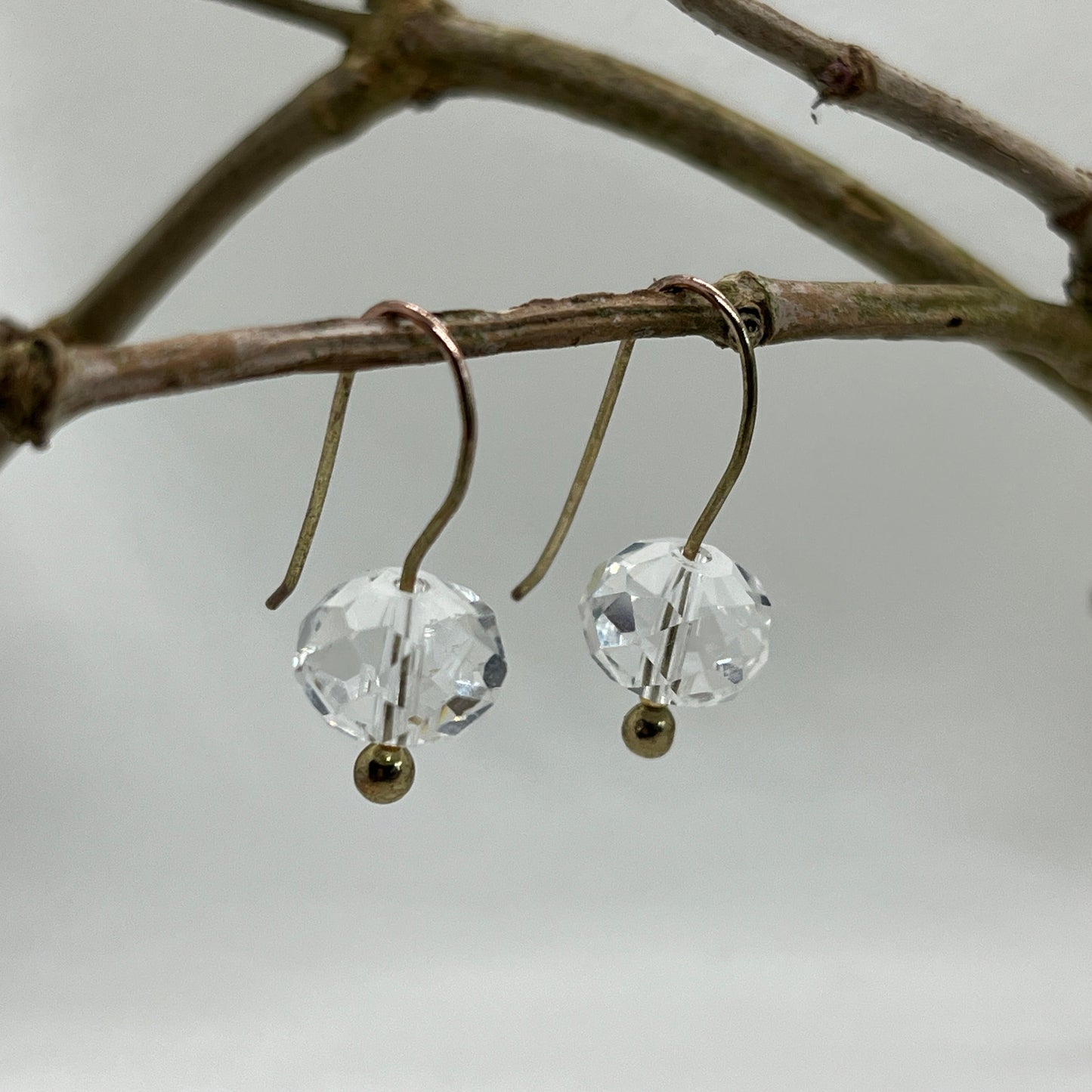 Messing ørekrog med Krystal