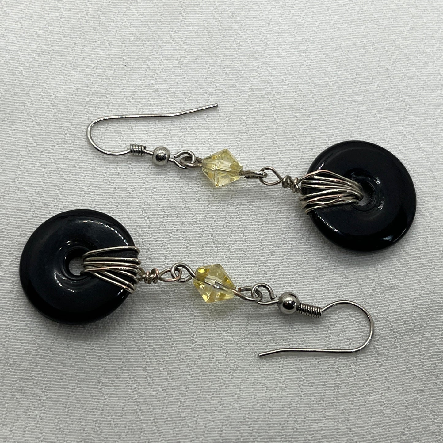 Øreringe i sølv med sort vedhæng