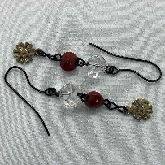 Sorte øreringe med klare krystaller