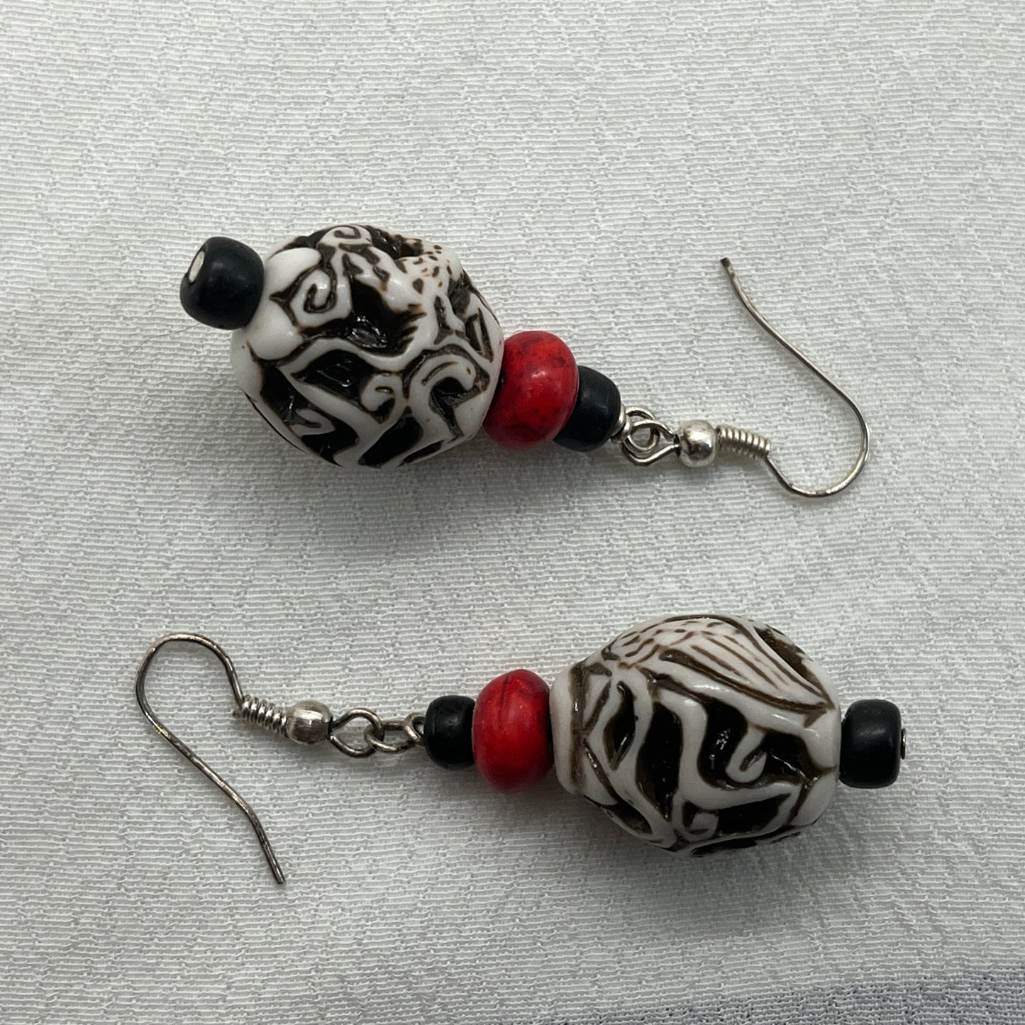 Sølv øreringe med arabesk perle