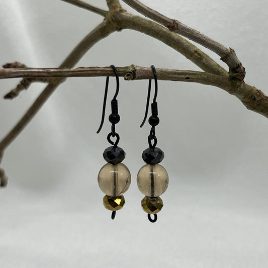 Sorte øreringe med champagne