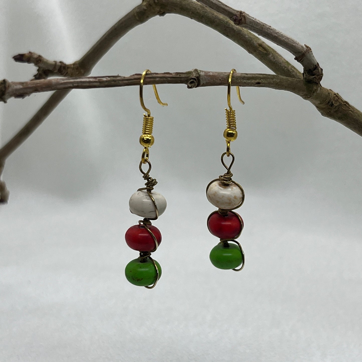 Messing øreringe med 3 på stribe