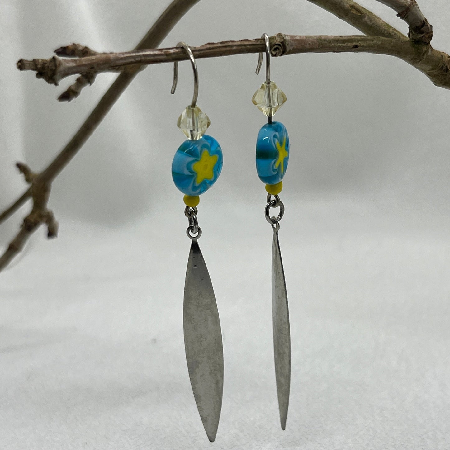 Sølv øreringe med blå stjerneperle