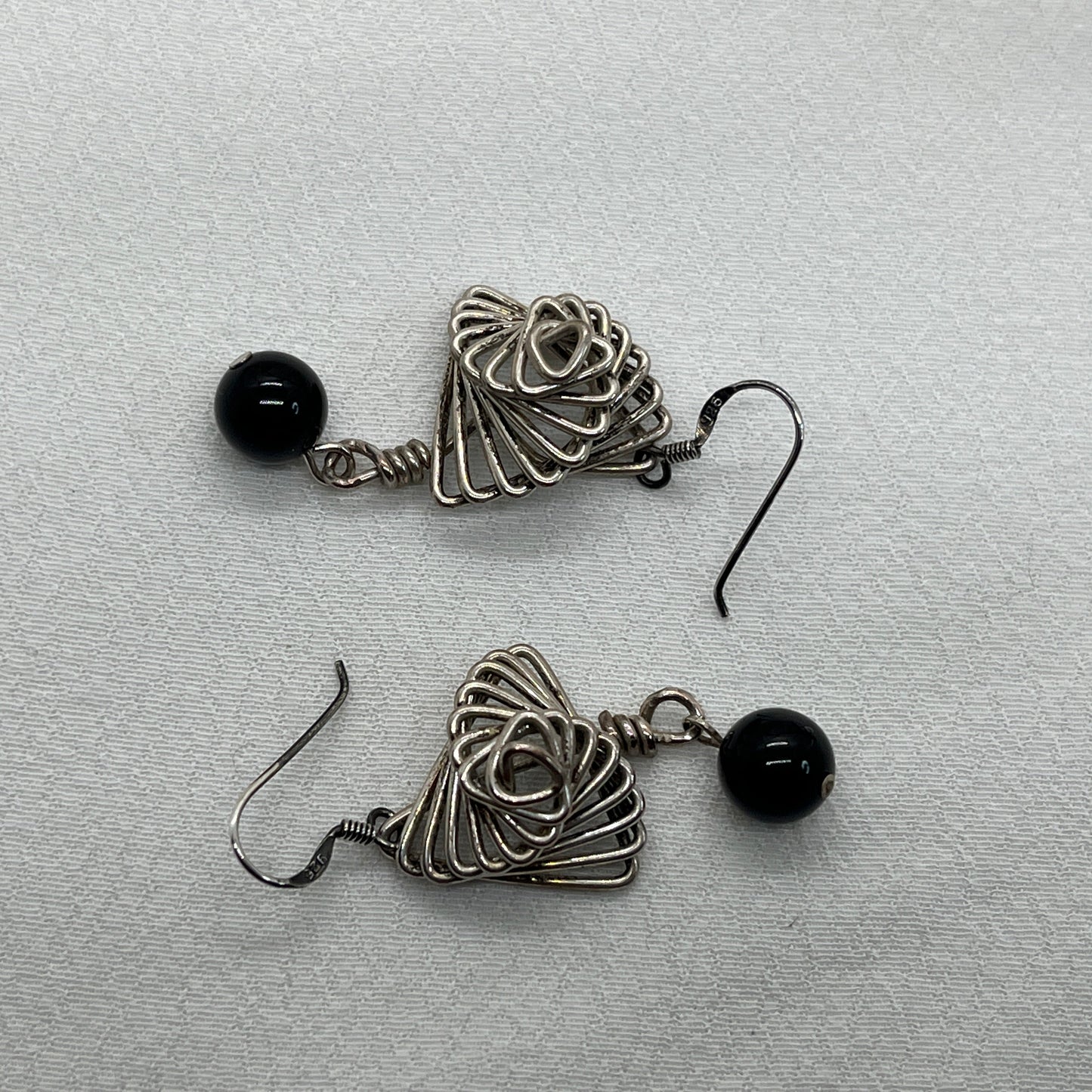 Sølv øreringe med spiraler