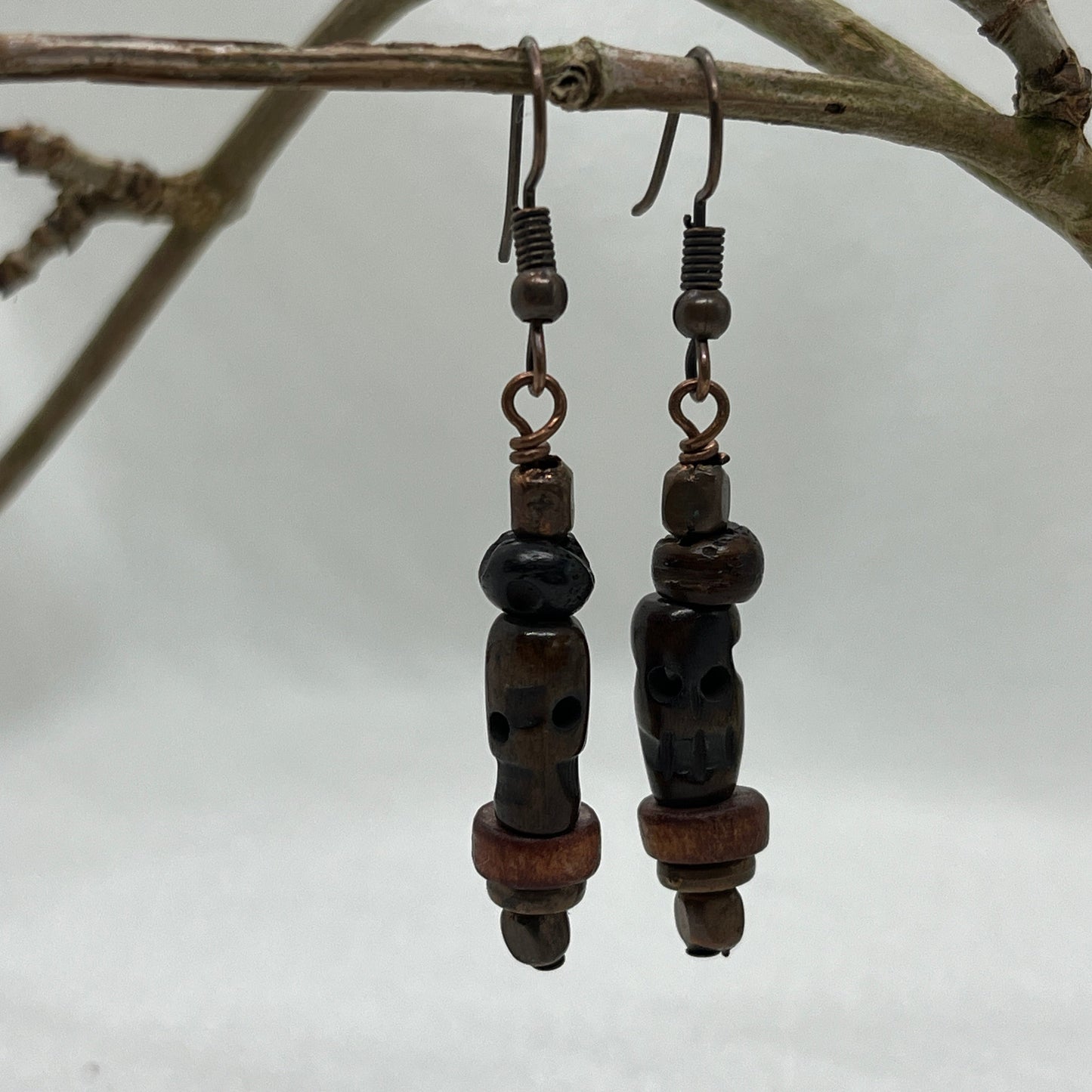 Kobber øreringe med Tigerøje kranie