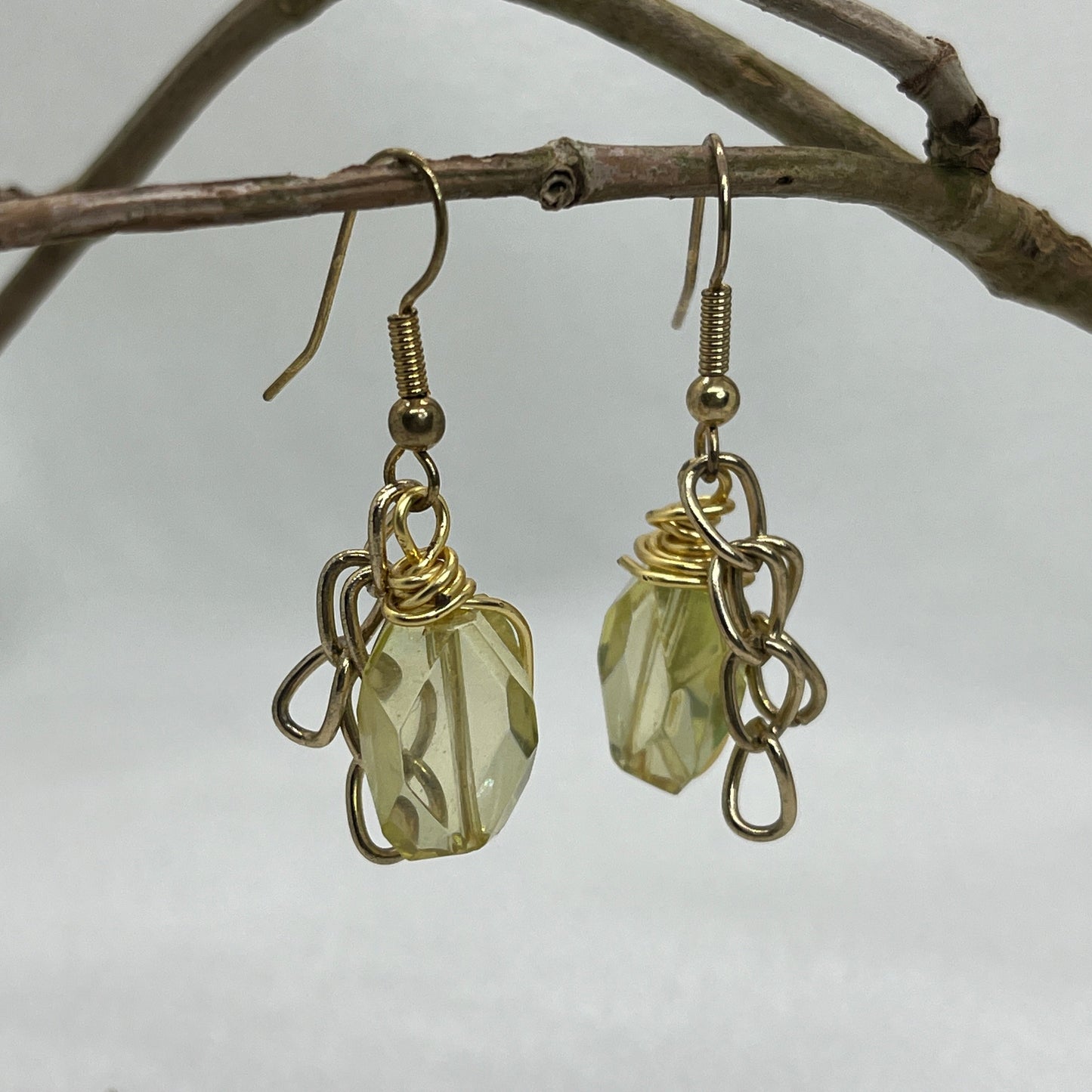 Messing øreringe og gul-guld