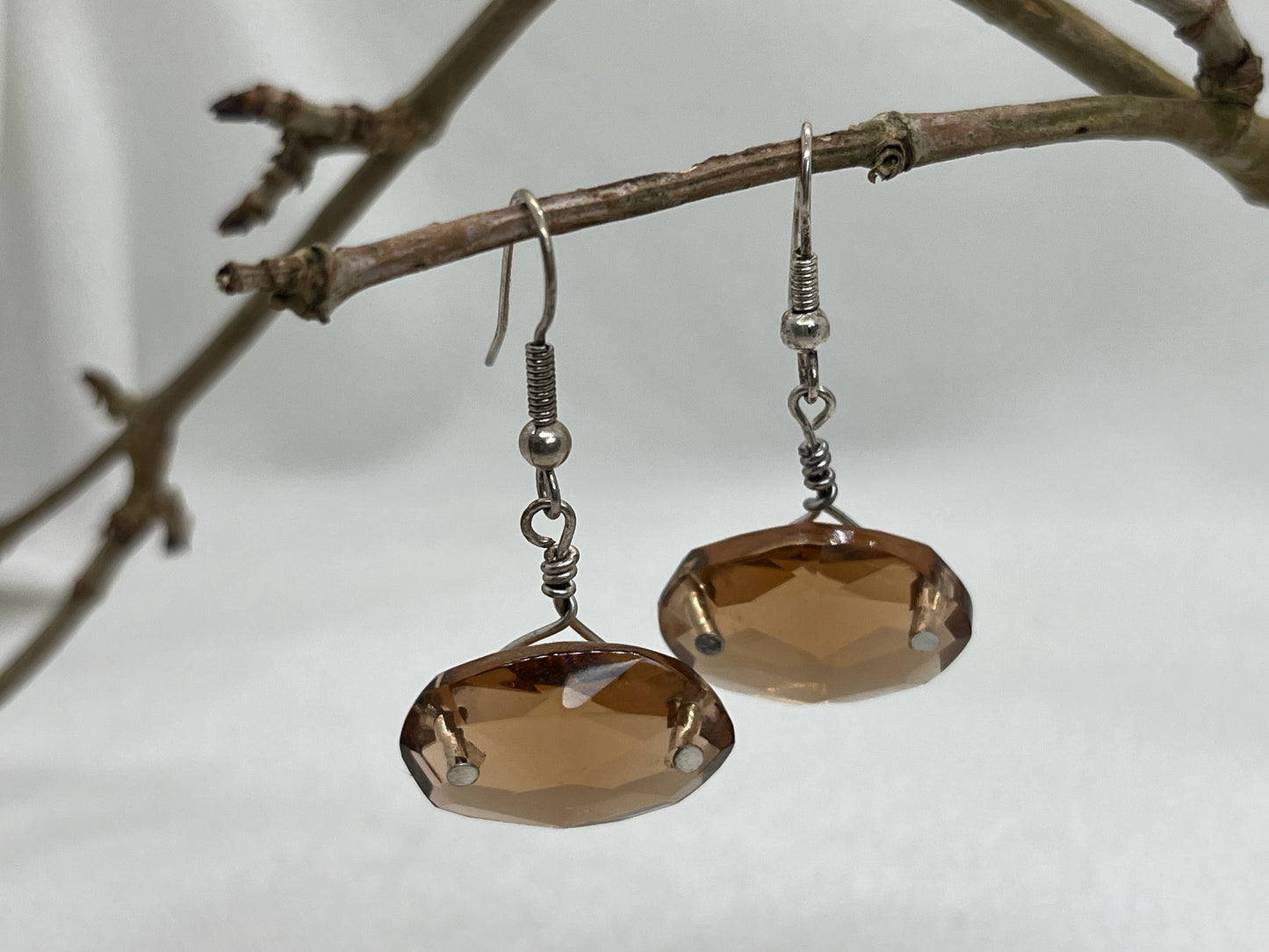 Ørering i sølv med en kvart lysekrone