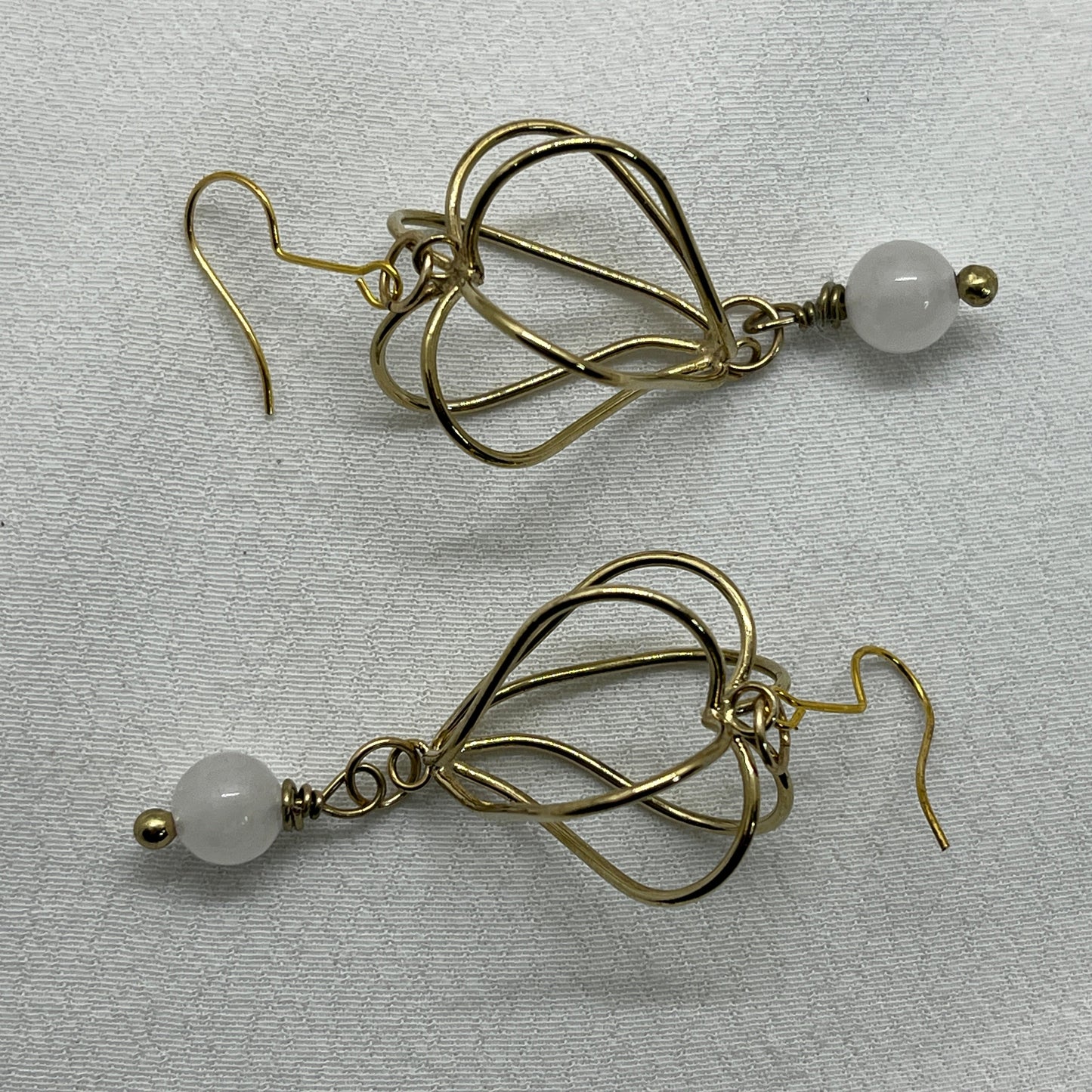 Ørering i messing med hjerteformet vedhæng