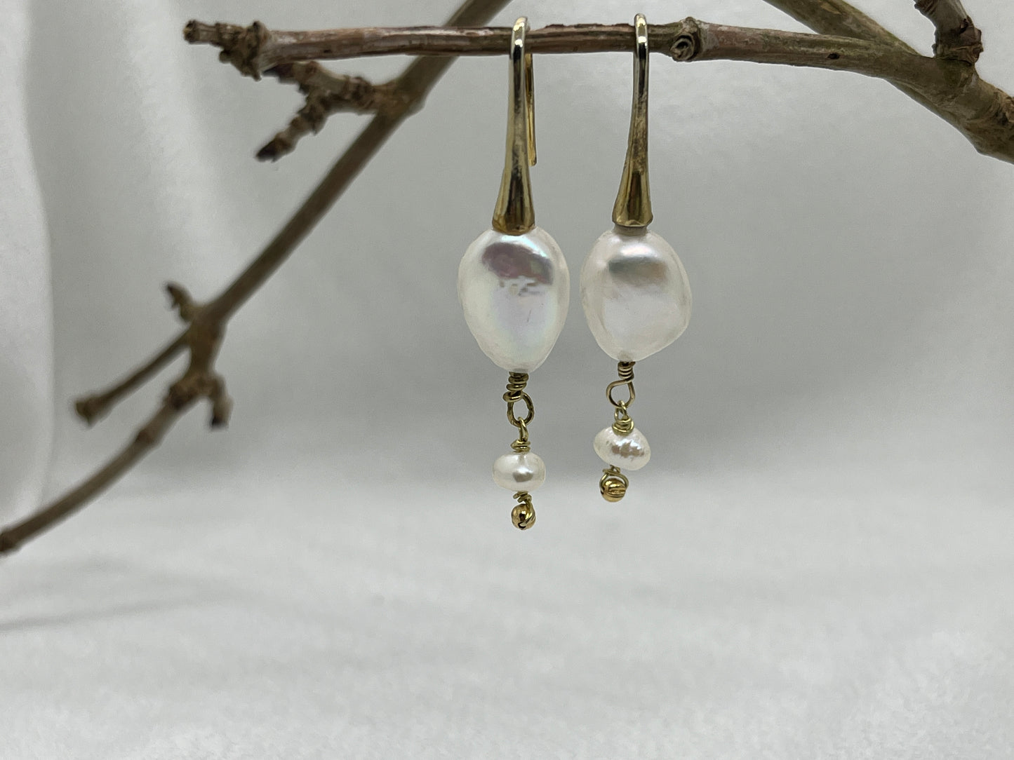 Guld øreringe med Ferskvandsperler