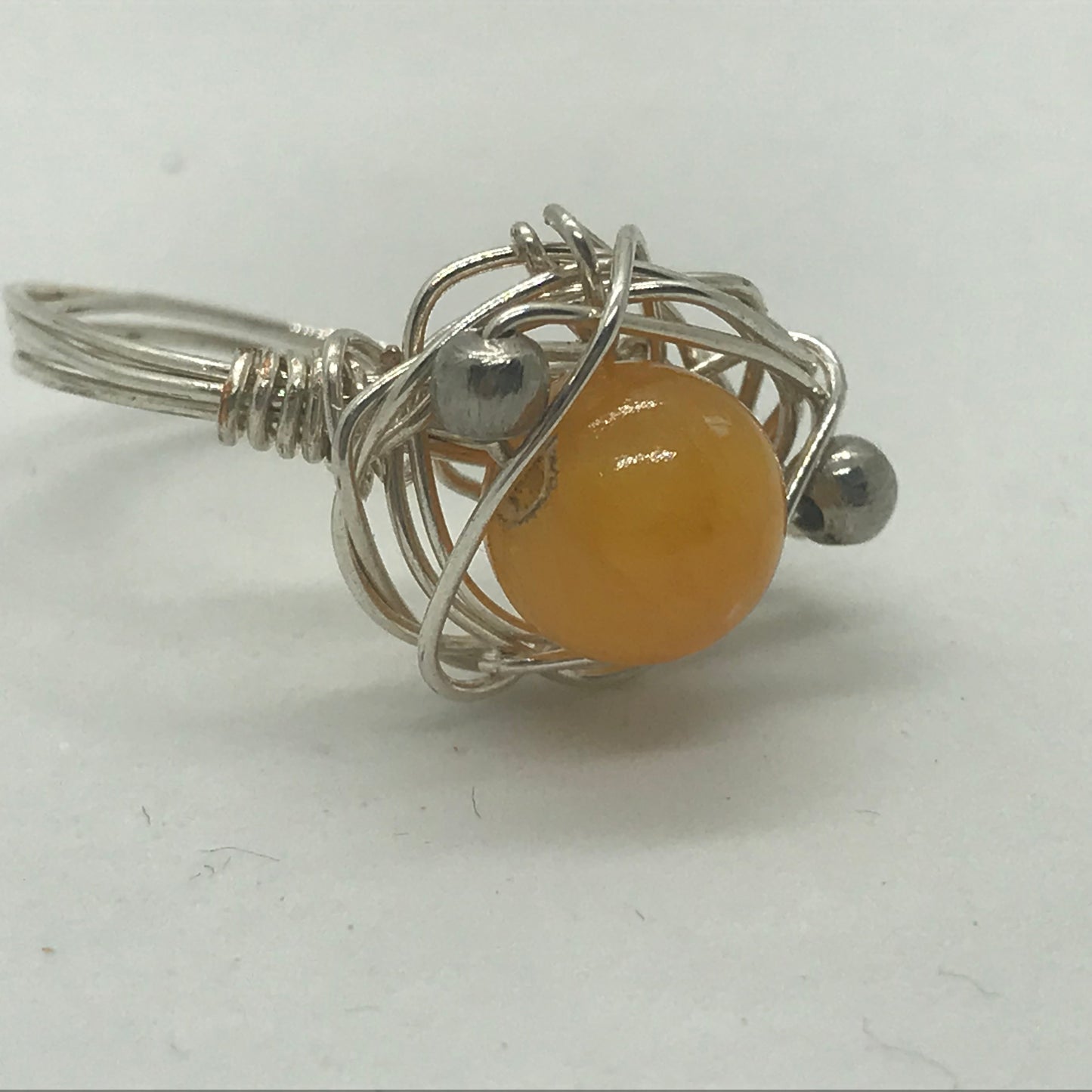 Sølvring med orange Topaz Jade