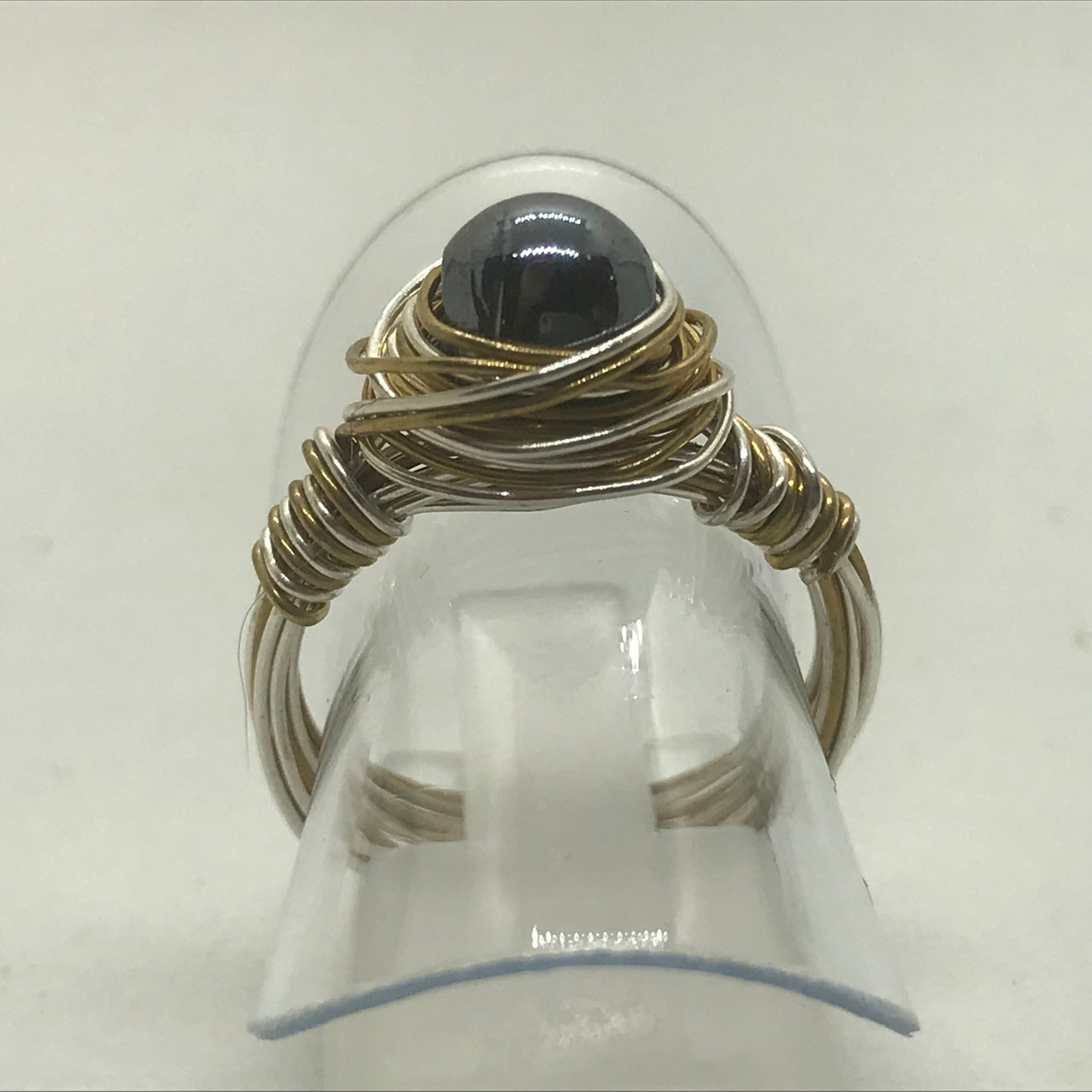 Ring i blandet sølv og messingtråd med Hæmatit