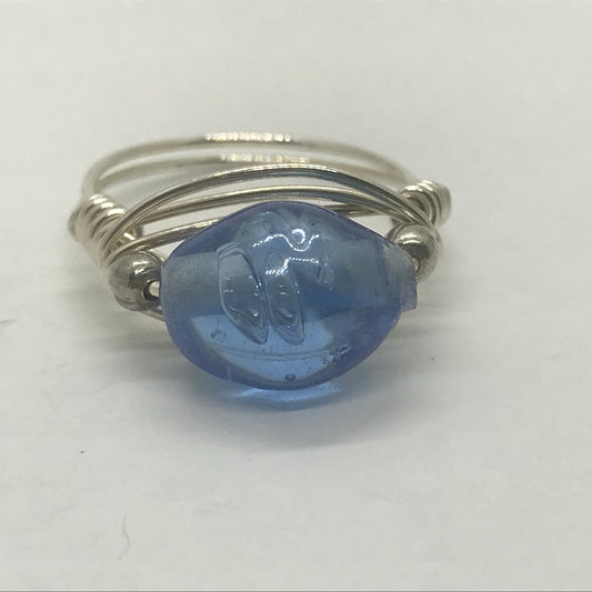 Ring i sølv med klar blå glasperle