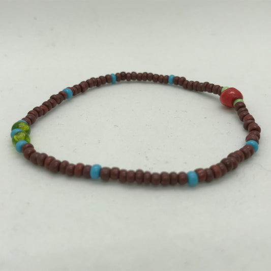 Brunt elastisk armbånd med seedbeads