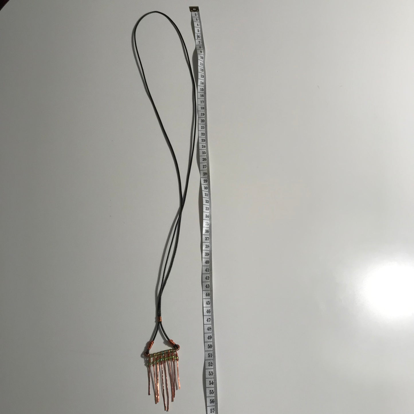 Skind halskæde med kobbervedhæng